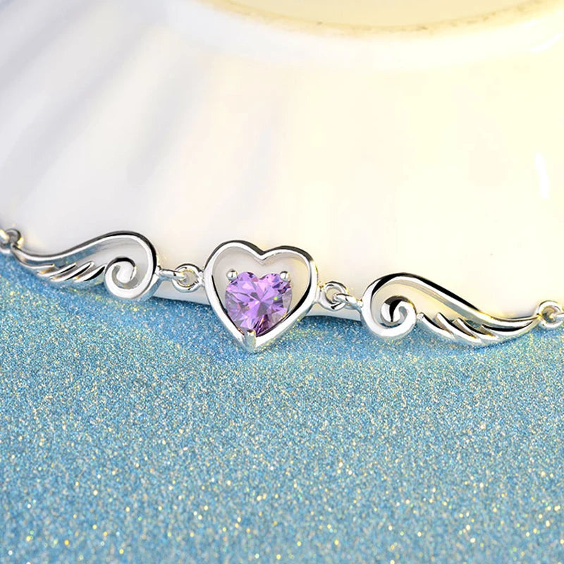 Srebrne skrzydło anioła z cyrkonią na obojczyku