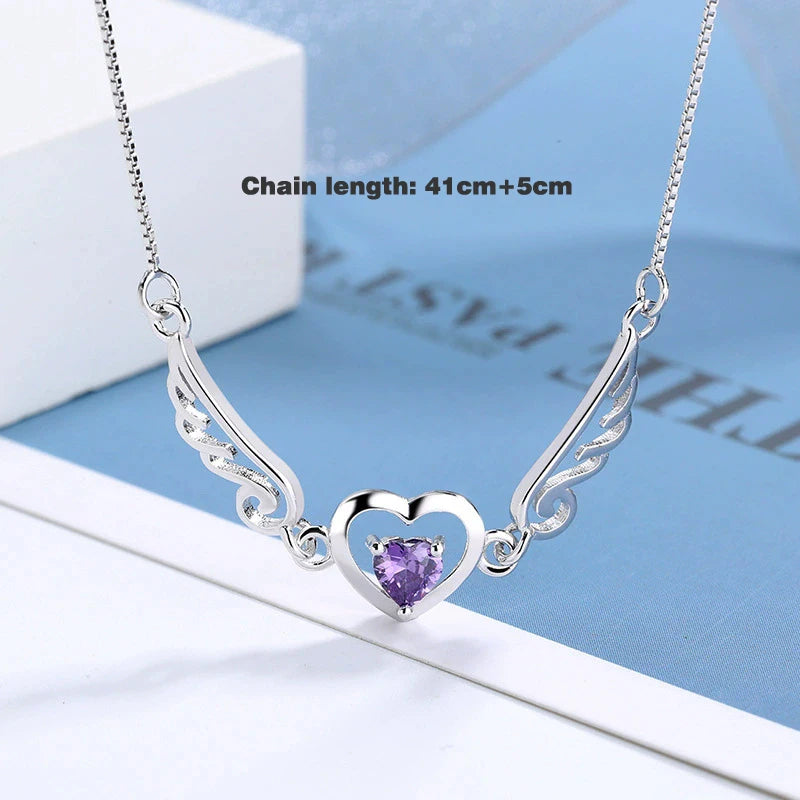 Srebrne skrzydło anioła z cyrkonią na obojczyku