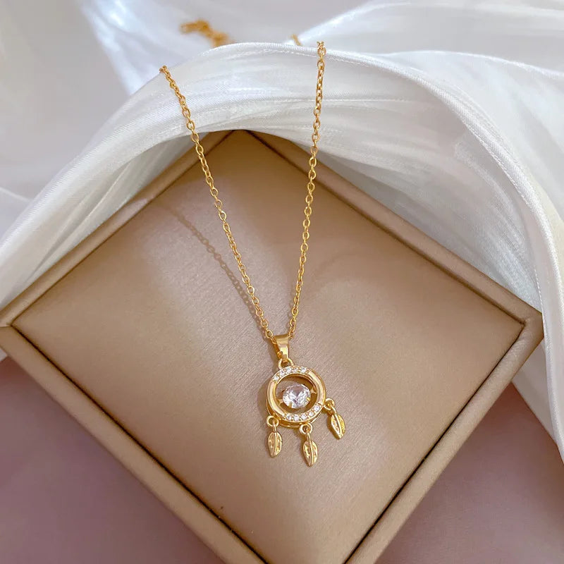 Naszyjnik ze stali nierdzewnej z zawieszką w kształcie łapacza snów i cyrkonii