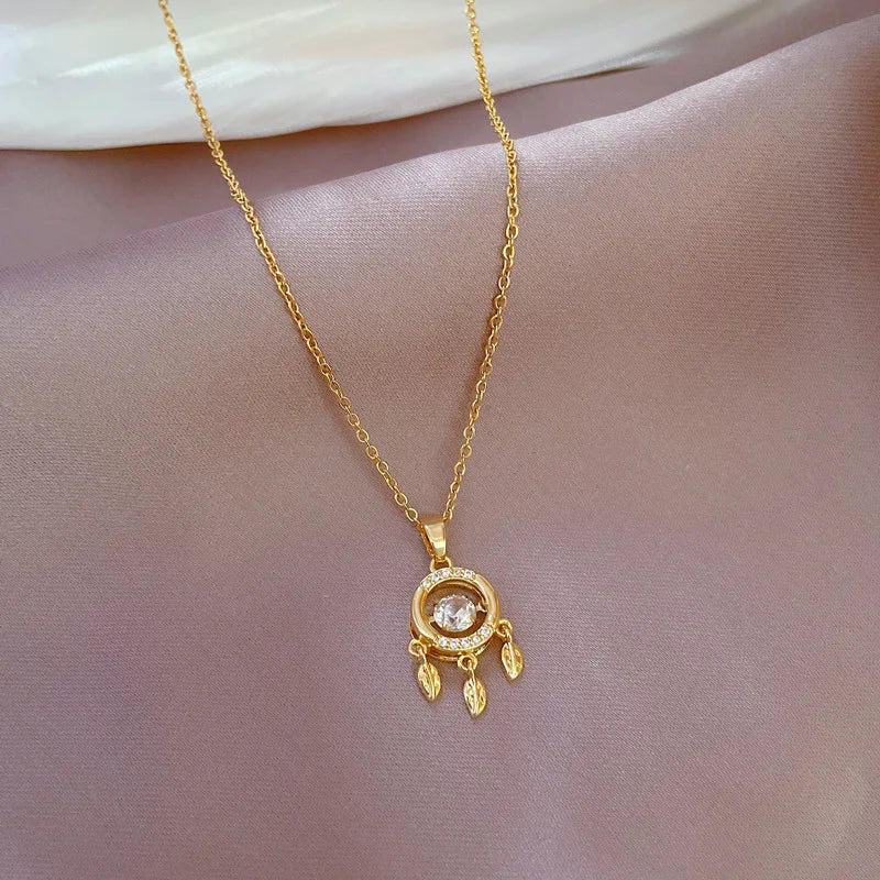 Naszyjnik ze stali nierdzewnej z zawieszką w kształcie łapacza snów i cyrkonii