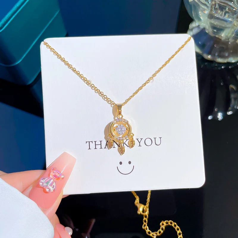 Naszyjnik ze stali nierdzewnej z zawieszką w kształcie łapacza snów i cyrkonii